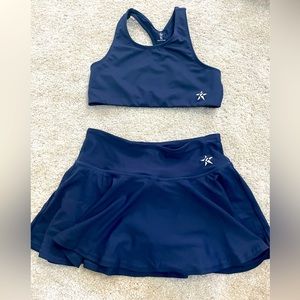 YL Rebel Athletics sports bra and flouncy skirt